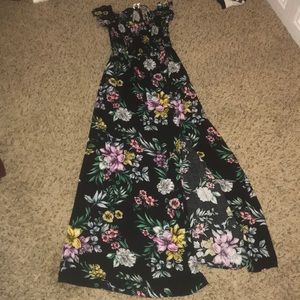 Long black dress with flower design and leg slit